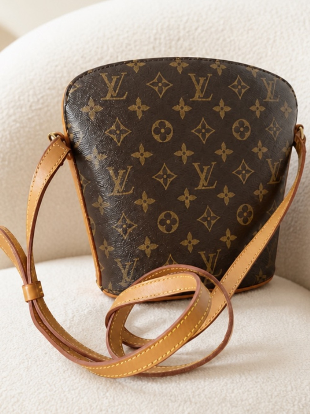 Louis Vuitton Monogram Drouot Crossbody Bag in Brown and Tan.